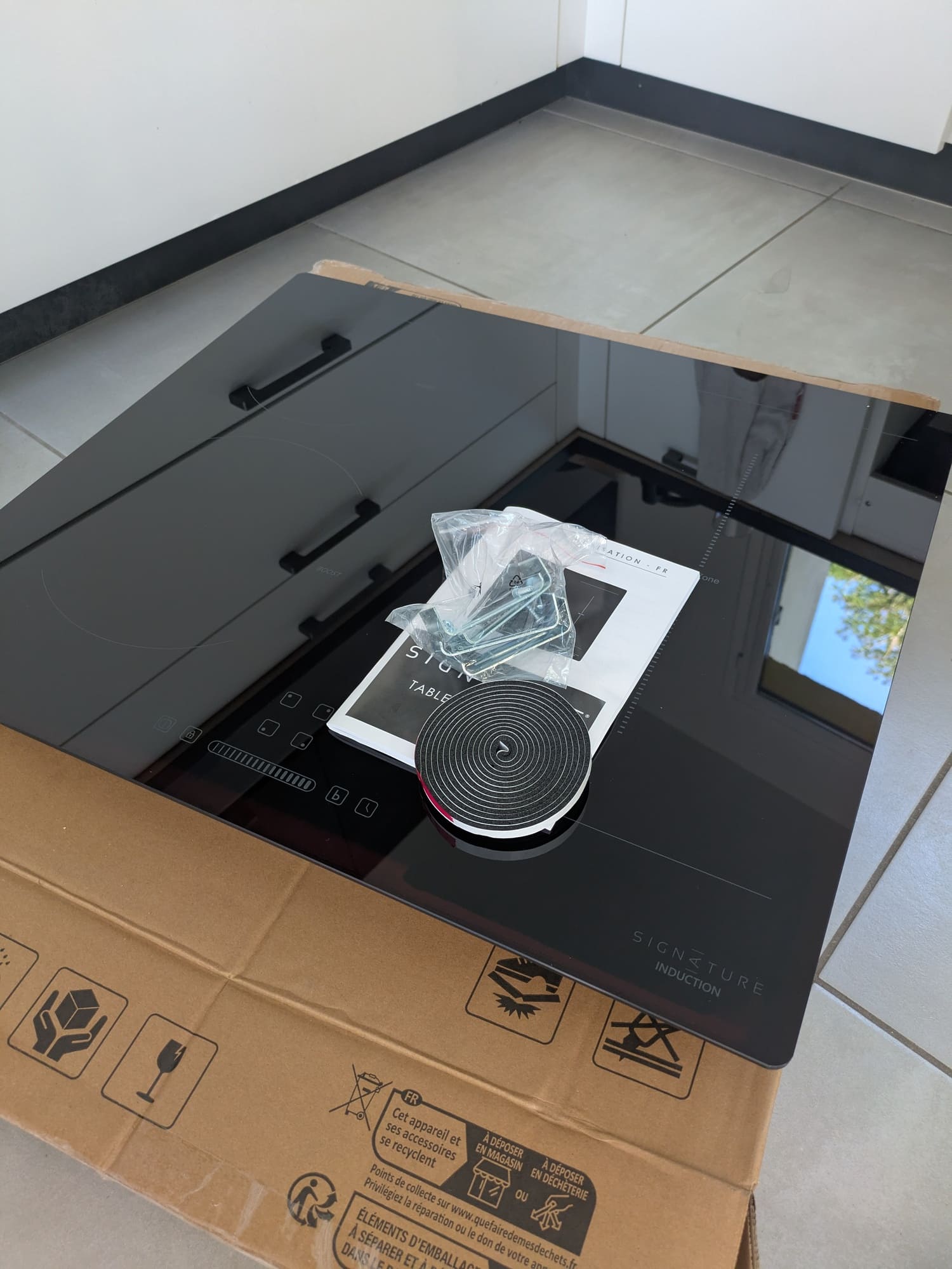 Comment Changer plaque à induction